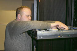 One of VCUCC's sysadmins working on a server
